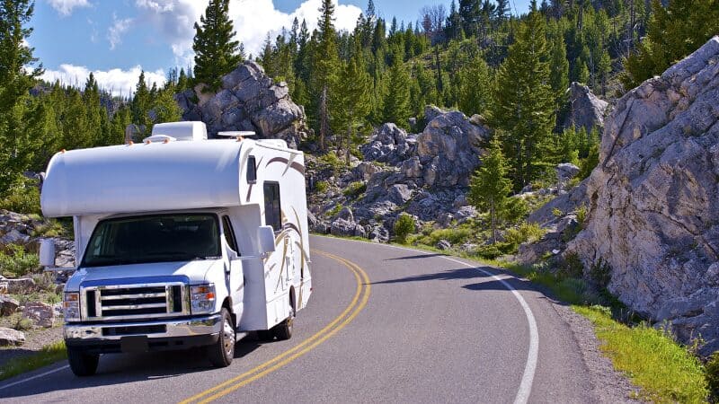 A motorhome driving on the road

